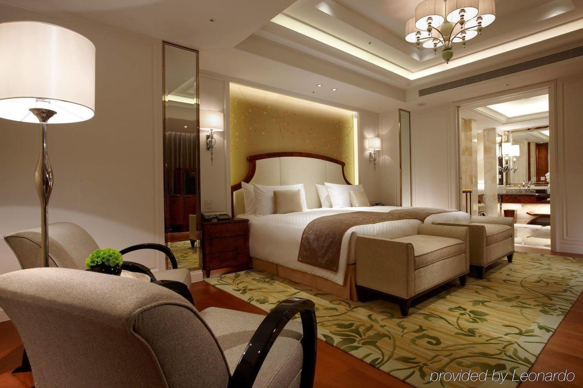 Hotel The Okura Prestige Tchaj-pej Exteriér fotografie A bedroom at the hotel